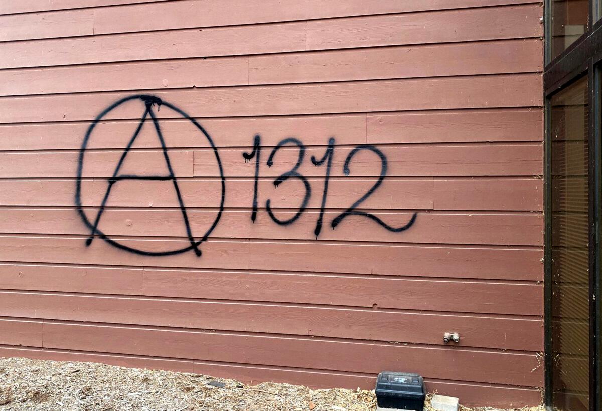 Graffiti was sprayed onto the Wisconsin Family Action office in Madison, Wis., on May 8, 2022. (Alex Shur/Wisconsin State Journal via AP)