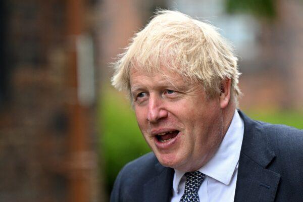 Britain's Prime Minister Boris Johnson arrives to attend a Cabinet away day at Middleport Pottery in Stoke on Trent, England, on May 12, 2022. (Oli Scarff - WPA Pool/Getty Images)