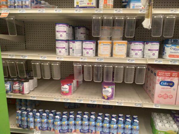 The shelves at a Marc's grocery store, which has started rationing cans of powdered baby formula, in the west Cleveland suburb of Lakewood, Ohio, on May 13, 2022. (Michael Sakal/The Epoch Times)