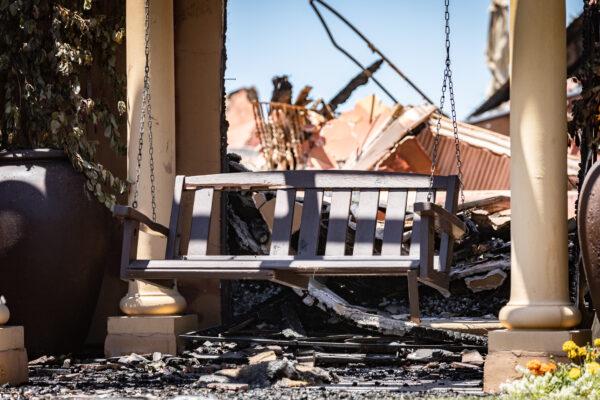 First-responders continue their efforts in the containment of the Coastal Fire as teams work through the debris of the destruction of the Coronado Pointe neighborhood of Laguna Niguel, Calif., on May 13, 2022. (John Fredricks/The Epoch Times)