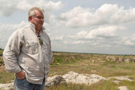 Nigel Ferguson, the general director of the Australia's AVZ Minerals looks on while at the lithium mine in Manono in the Democratic Republic of Congo. The country is rich with lithium, an essential mineral for electric car batteries, which nests in the remains of the former mining town of the city of Manono in the south-east of the country in the province of Tanganyika, on Feb. 17, 2022. (Junior Kannah/AFP via Getty Images)