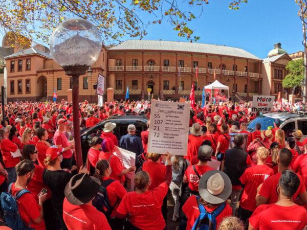 School teachers march along Macquarie St towards NSW Parliament in Sydney, Australia on May 04, 2022. (Photo by Jenny Evans/Getty Images)