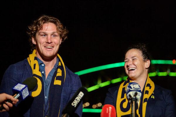 Michael Hooper and Shannon Parry speak to the media in front of The Sydney Harbour Bridge, lit in support of Rugby Australia's 2027 & 2029 Rugby World Cup Bids, in Sydney, Australia, on May 12, 2022. (Photo by Brett Hemmings/Getty Images for Rugby Australia)