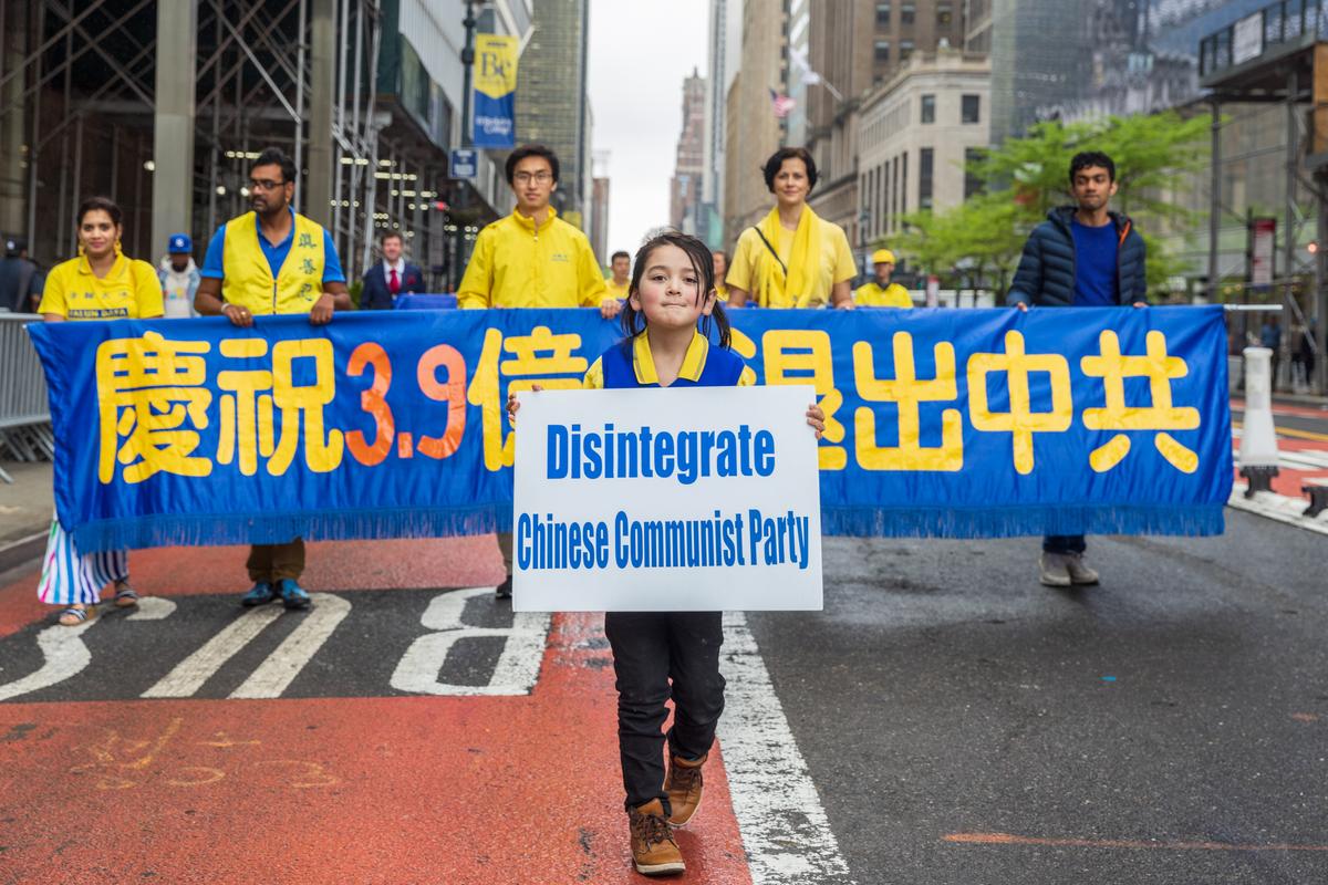 Falun Gong practitioners take part in a parade marking the 30th anniversary of its introduction to the public, in Manhattan, New York, on May 13, 2022. (Mark Zou/The Epoch Times)