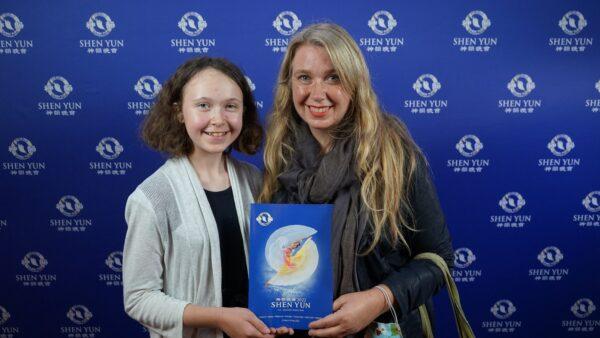 Jamie Webster with her daughter Zora after seeing Shen Yun Performing Arts at the Adelaide Festival Centre in Adelaide, Australia, on May 13, 2022. (NTD)