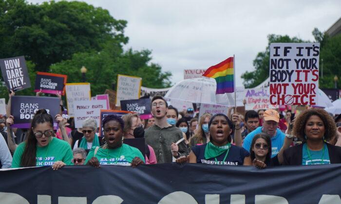 Thousands of Pro-Abortion Protesters March to the Supreme Court