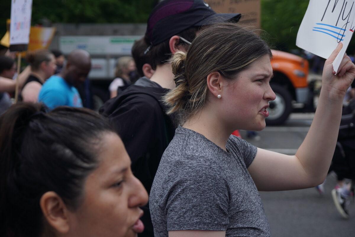A pro-abortion protester shouts on the Bans off Our Bodies march in Washington on May 14, 2022. (Jackson Elliott/The Epoch Times)