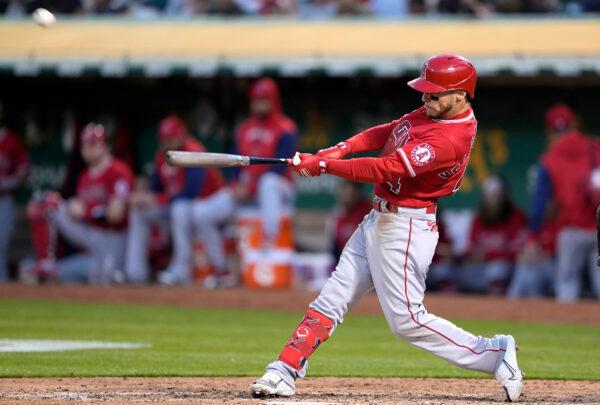 Andrew Velazquez #4 of the Los Angeles Angels hits a solo home run against the Oakland Athletics in the top of the fifth inning at RingCentral Coliseum, in Oakland, Calif., on May 13, 2022. (Thearon W. Henderson/Getty Images)