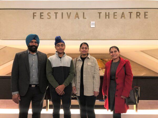 Rupinderdeep Kaur (R) with her family seeing Shen Yun Performing Arts at the Adelaide Festival Centre in Adelaide, Australia, on May 13, 2022. (Rebecca Zhu/The Epoch Times)