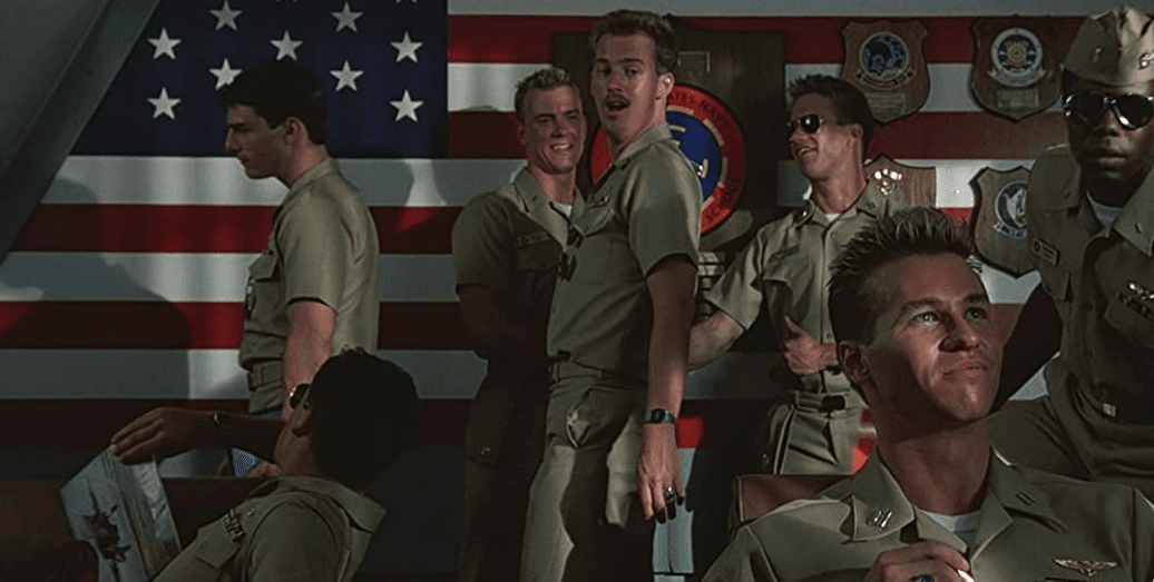 (L–R) Maverick (Tom Cruise), Chipper (Adrian Pasdar), Wolfman (Barry Tubb) Goose (Anthony Edwards), Slider (Rick Rossovich), Ice Man (Val Kilmer), and Sundown (Clarence Gilyard, Jr.) in "Top Gun: Maverick." (Paramount Pictures)