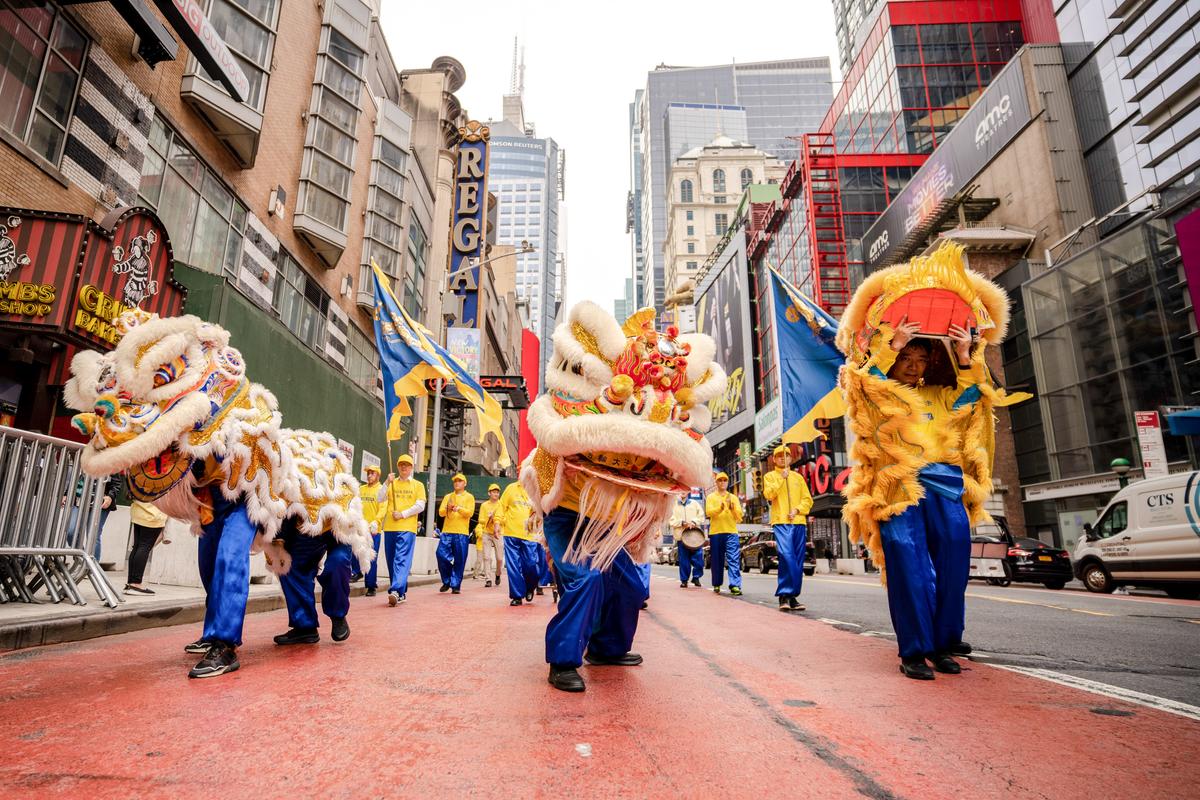 Falun Gong practitioners take part in a parade marking the 30th anniversary of its introduction to the public, in Manhattan, New York, on May 13, 2022. (Samira Bouaou/The Epoch Times)