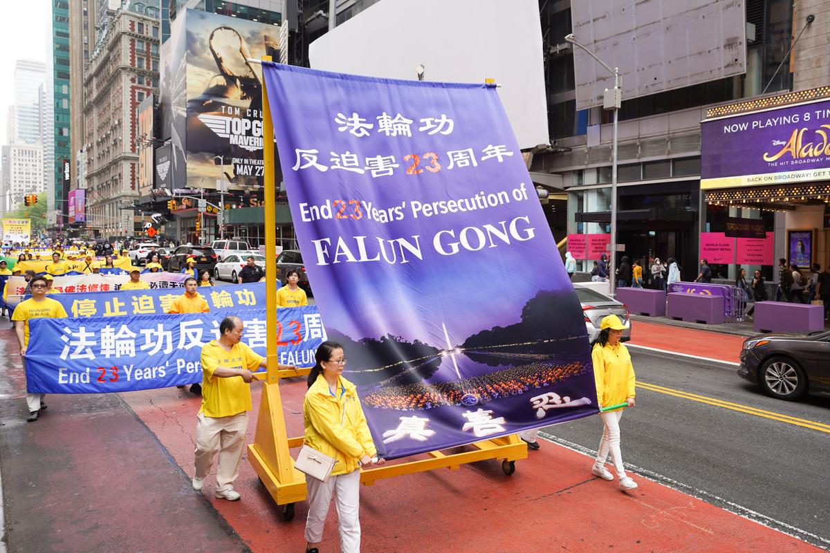 Falun Gong practitioners take part in a parade marking the 30th anniversary of its introduction to the public, in Manhattan, New York, on May 13, 2022. (The Epoch Times)