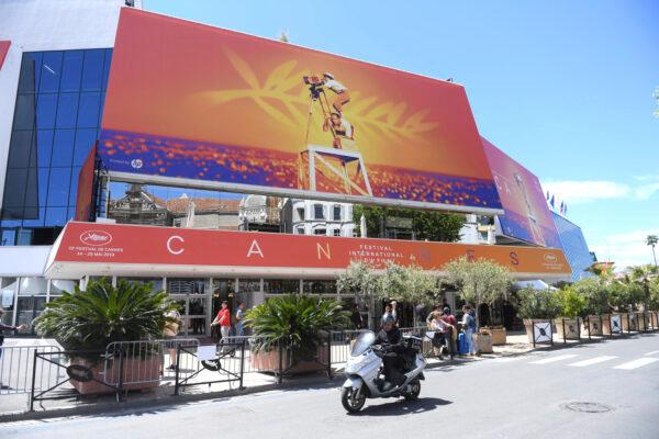 A scooter drives past the Palais des festivals during the 72nd Cannes Film Festival in Cannes, France, on May 13, 2019. (Arthur Mola/Invision/AP)