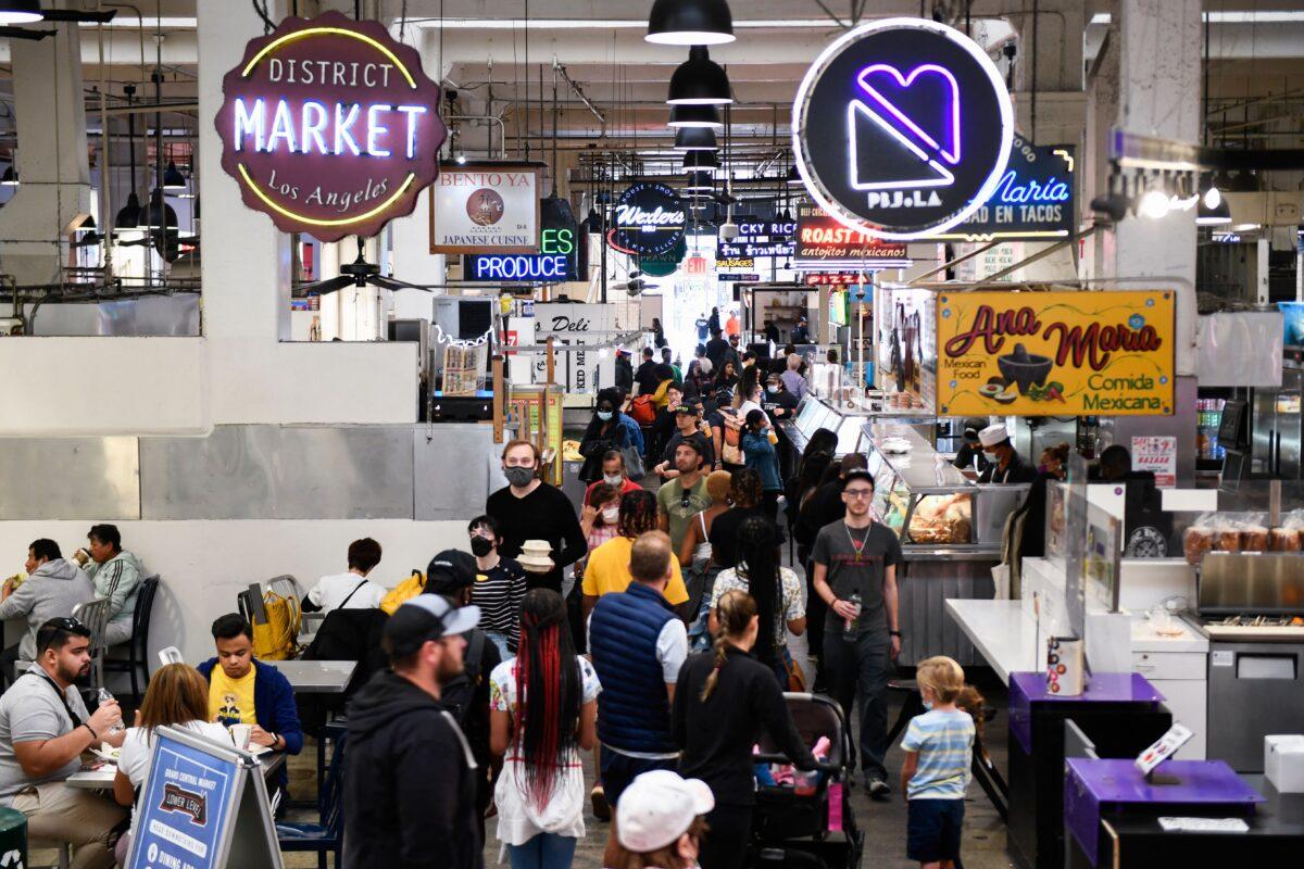 Customers browse food stalls inside Grand Central Market in downtown Los Angeles on March 11, 2022. Fears of stagflation in the U.S. economy are on the rise. (Patrick T. Fallon/AFP via Getty Images)