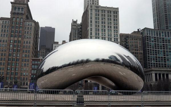 A barricade surrounds Anish Kapoor's Cloud Gate sculpture (AKA The Bean) in Millennium Park in Chicago on March 19, 2020. (Scott Olson/Getty Images)