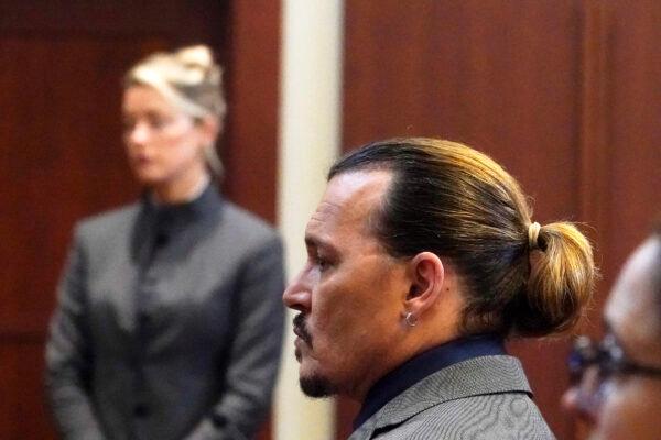 Actor Johnny Depp walks into the courtroom after a break at the Fairfax County Circuit Courthouse in Fairfax, Va., on May 16, 2022. (Steve Helber/Pool via AP Photo)