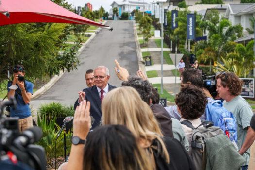 Prime Minister Scott Morrison takes questions from the media at a press conference following a visit to Springfield Rise Sales & Information Centre, which is in the Blair electorate in Brisbane, Australia on May 16, 2022. (Asanka Ratnayake/Getty Images)