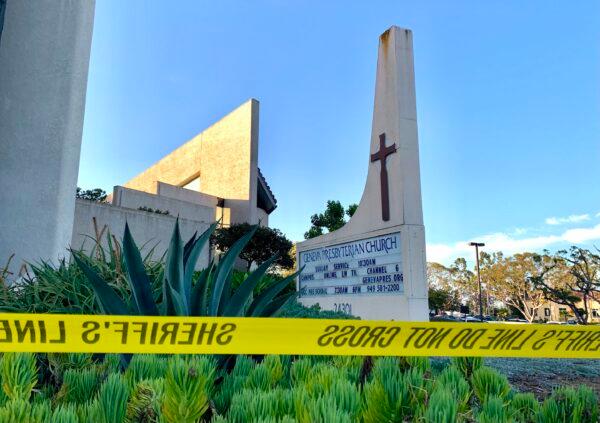 Police tape at Geneva Presbyterian Church after a shooting left one dead and five injured in Laguna Woods, Calif., on May 15, 2022. (John Fredricks/The Epoch Times)