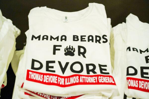 A T-shirt that represents mothers in support of Illinois attorney general candidate Thomas DeVore is on display at an event in Rockford, Ill., on May 9, 2022. (Cara Ding/The Epoch Times)
