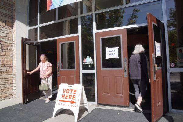 Voters enter and leave a polling location in Boise during Idaho's May 17 primary. (Allan Stein/The Epoch Times)