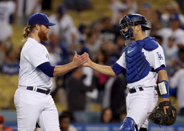 Craig Kimbrel #46 of the Los Angeles Dodgers celebrates a 5-4 win over the Arizona Diamondbacks with Austin Barnes #15 at Dodger Stadium, in Los Angeles, on May 16, 2022. (Harry How/Getty Images)
