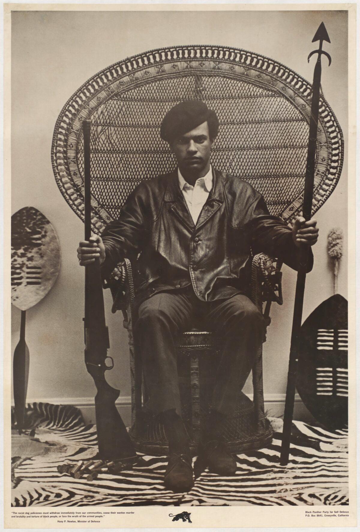 A poster of Black Panthers co-founder Huey Newton holding a rifle in his right hand and a spear in his left hand. Along the bottom of the print is the text: "The racist dog policemen must withdraw immediately from our communities, cease their wanton murder and brutality and torture of black people, or face the wrath of the armed people." (Public Domain)