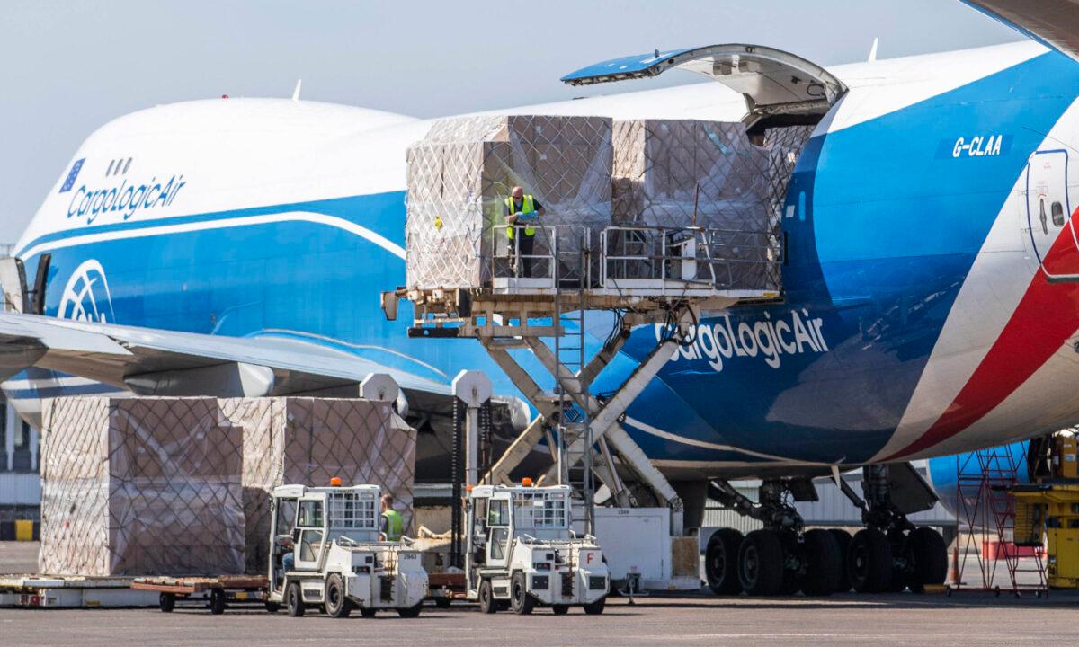 CargoLogicAir flight CLU 5694 lands with a consignment of NHS medical supplies and PPE from China at Prestwick Airport, Glasgow, Scotland, on June 1, 2020. (Jane Barlow/PA Media)