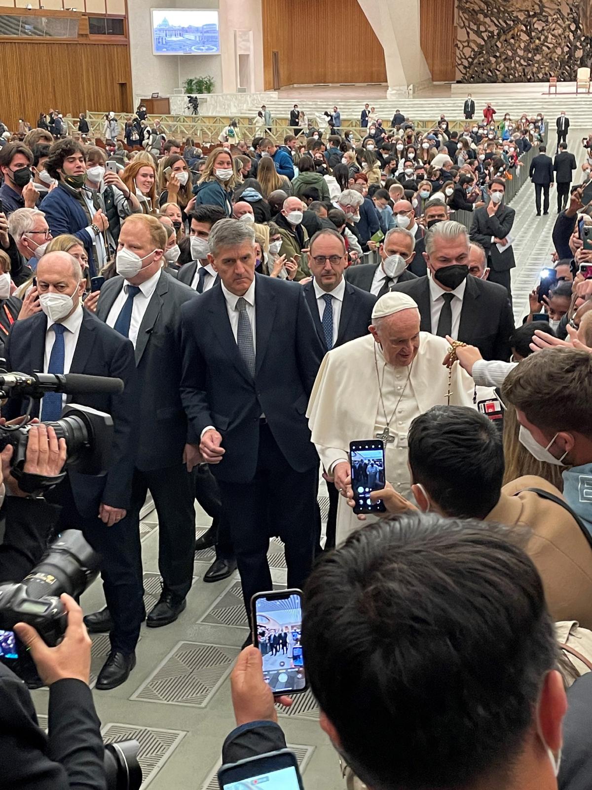 Pope Francis walks up the center aisle to greet the faithful at a Wednesday audience in the Vatican. (Photo courtesy of David Frederikson)