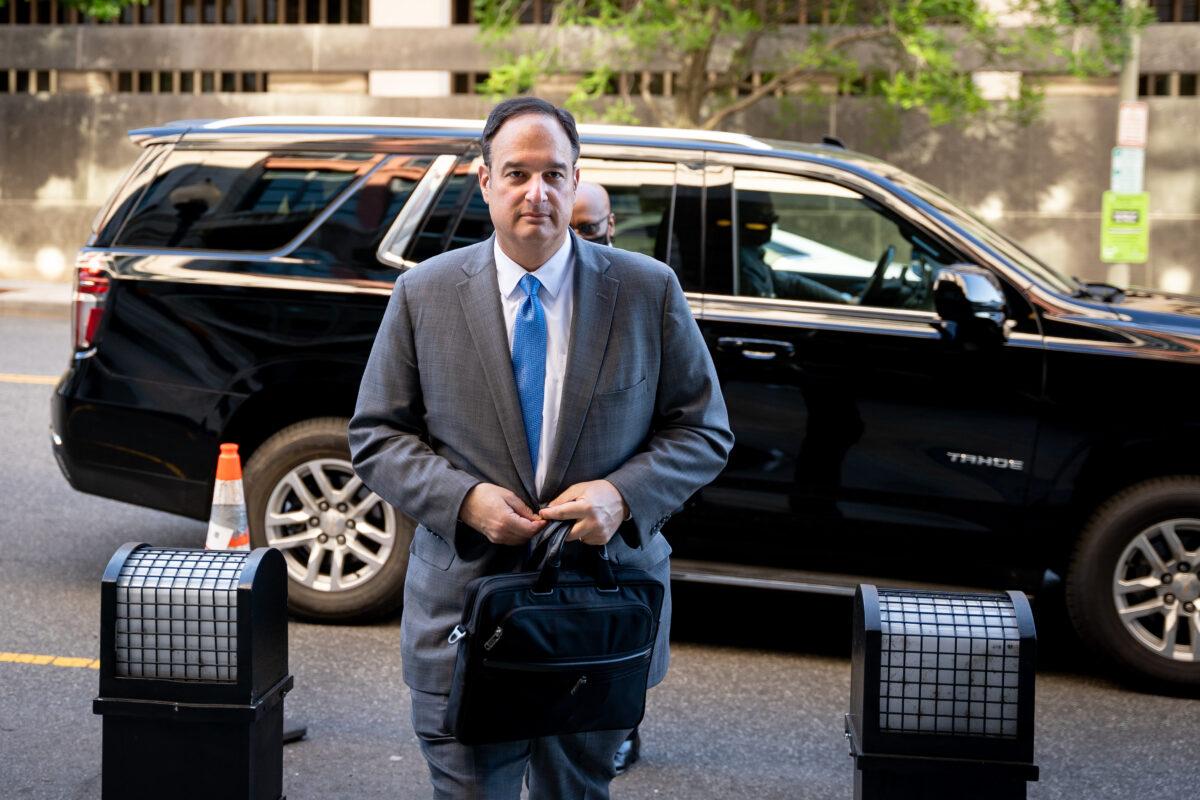 Michael Sussmann arrives at federal court in Washington on May 18, 2022. (Teng Chen for The Epoch Times)