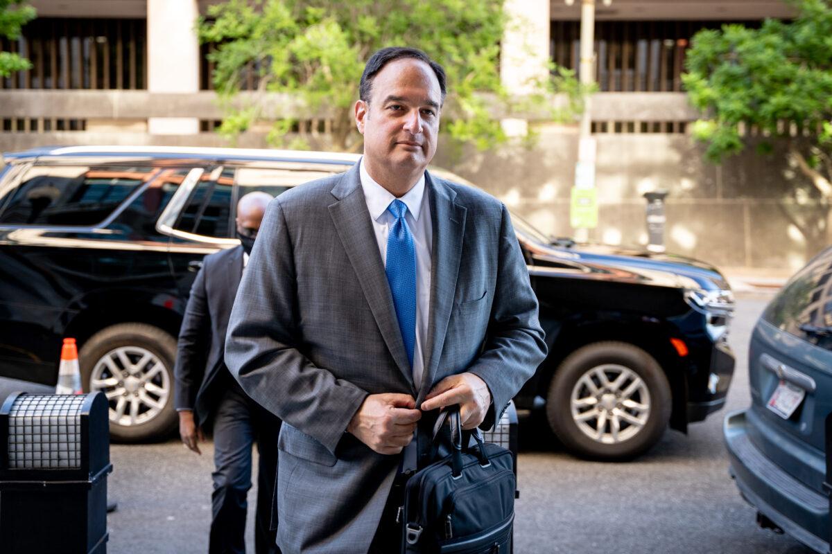 Michael Sussmann arrives at federal court in Washington on May 18, 2022. (Teng Chen for The Epoch Times)