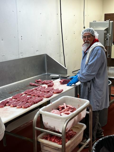 Longtime butcher Bill Evans is cutting steaks at King Kold Meats in Englewood, Ohio. King Kold has been in business for 74 years and provides meat and other products to area grocery stores and restaurants. (Photo courtesy King Kold Meats)