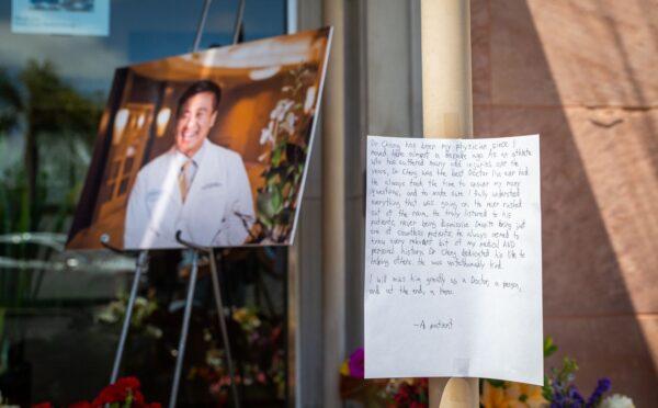 A letter commemorating shooting victim Dr. John Cheng at the entrance of South Bay Medical Group in Aliso Viejo, Calif., on May 17, 2022. (John Fredricks/The Epoch Times)