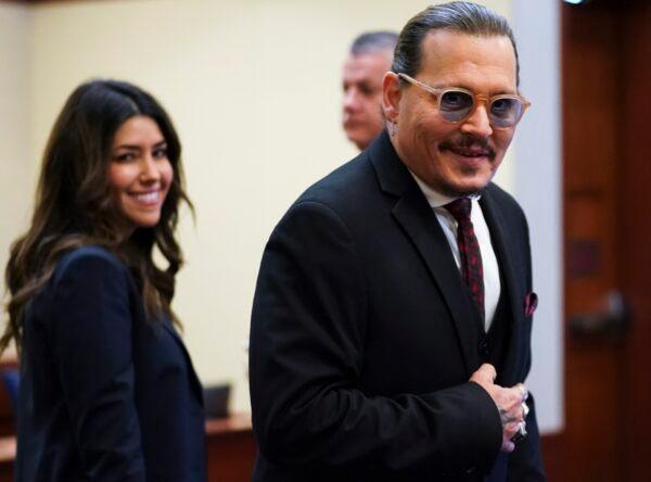 Actor Johnny Depp arrives in the courtroom at the Fairfax County Circuit Courthouse in Fairfax, Va., on May 18, 2022. (Kevin Lamarque/Pool Photo via AP)