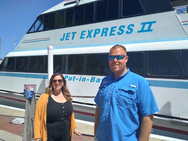 Port Clinton Area Chamber of Commerce President Nicole Kochensparger (L) and Kelly Freimark, general manager of the Jet Express ferry service, are preparing for their first full tourist season in two years following the Covid-19 pandemic. (Michael Sakal/The Epoch Times)