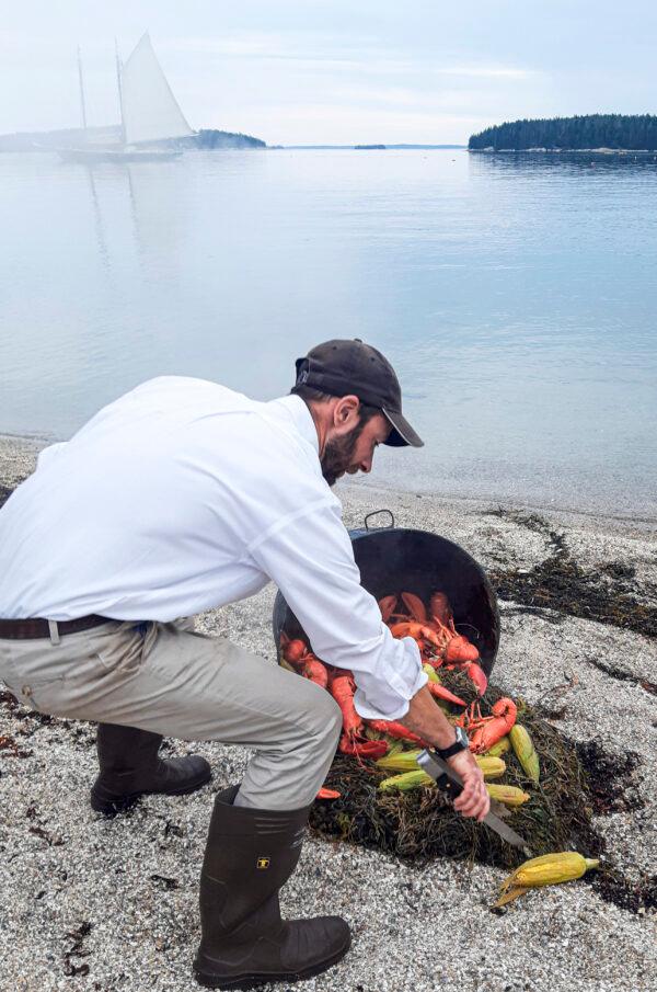 Visitors on the cruise can look forward to a dinner of fresh-caught lobsters baked over an open fire. (Jill Dutton for American Essence)