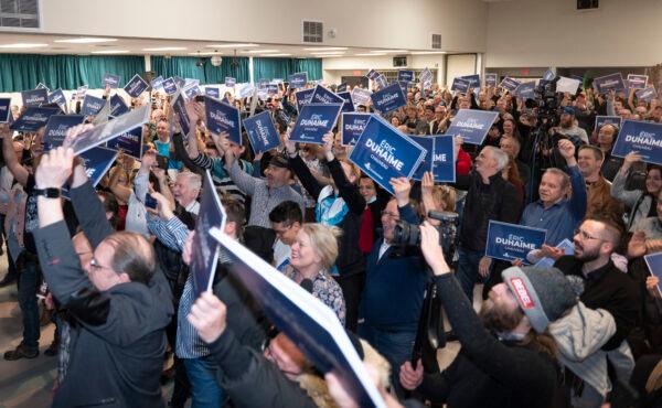  Supporters applaud Quebec Conservative Leader Éric Duhaime at a rally in Quebec City where he announced he will run in the Chauveau riding in the next provincial election in October, on April 5, 2022. (The Canadian Press/Jacques Boissinot)