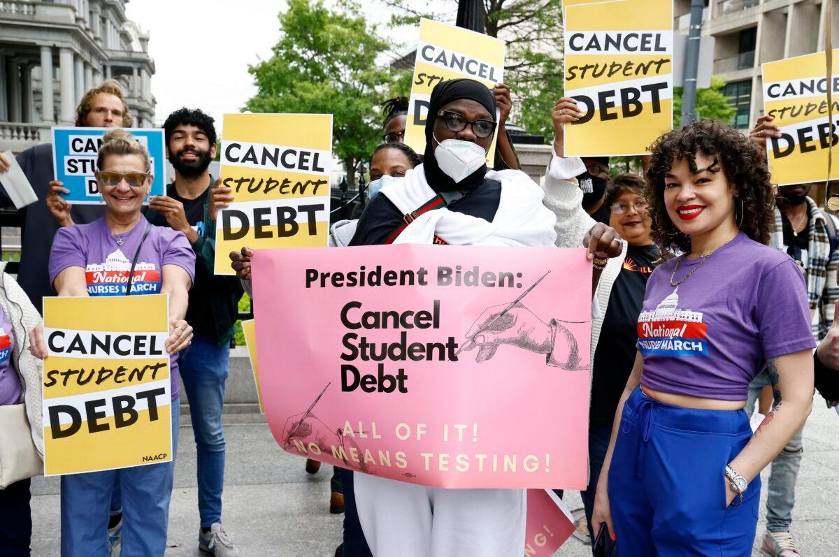Student loan borrowers gather near the White House in Washington to tell President Biden to cancel student debt on May 12, 2020. (Paul Morigi/Getty Images)