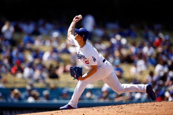 Walker Buehler #21 of the Los Angeles Dodgers throws against the Arizona Diamondbacks in the fifth inning at Dodger Stadium, in Los Angeles, on May 18, 2022. (Ronald Martinez/Getty Images)