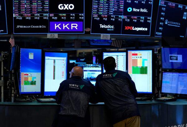 Traders work on the floor during the opening bell of the New York Stock Exchange in New York on May 16, 2022. (Timothy A. Clary/AFP via Getty Images)