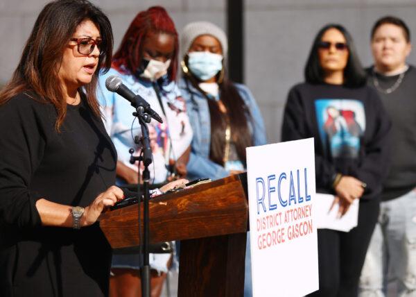 Farida Baig, whose father, Shahid Ali Baig, was murdered in 1980, speaks at a press conference by supporters of an effort to recall Los Angeles District Attorney George Gascón, in Los Angeles on Dec. 6, 2021. (Mario Tama/Getty Images)