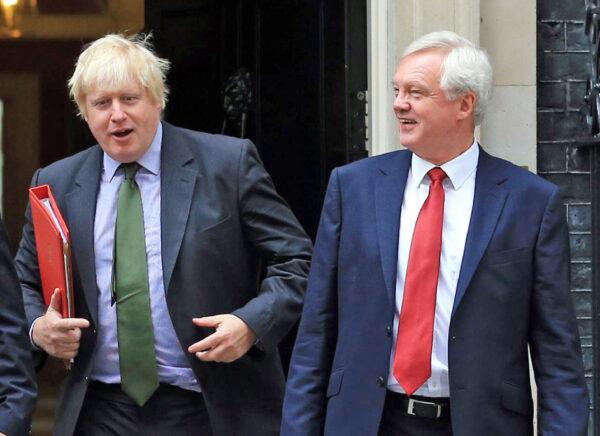  The then-Brexit secretary David Davis (right) with then-Foreign Secretary Boris Johnson outside Downing Street in London in July 2016. (Gareth Fuller/PA)