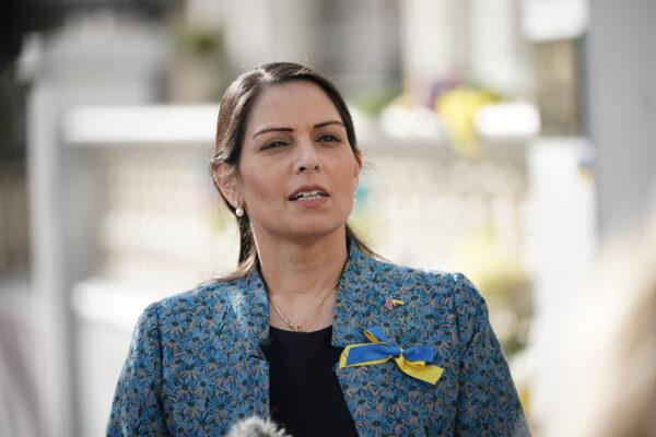Britain's Home Secretary Priti Patel said the threat of hostile activity from states targeting "our democracy, economy and the values we hold dear is real and ever-evolving", as she outlined new sweeping powers to counter hostile states, singling out Russia and China. (Yui Mok/PA)