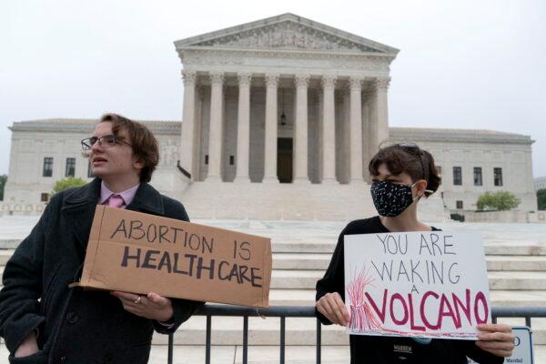 Pro-abortion demonstrators stand outside the U.S. Supreme Court in Washington on May 3, 2022. (AP Photo/Jose Luis Magana)