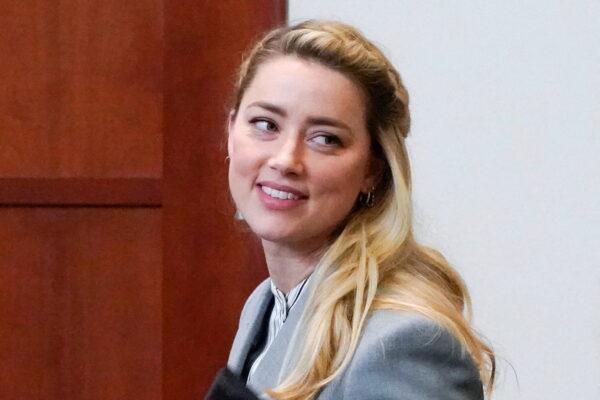 Actress Amber Heard leaves during a break in the courtroom during closing arguments during her ex-husband Johnny Depp's defamation case against her at the Fairfax County Circuit Courthouse in Fairfax, Va., on May 27, 2022. (Steve Helber/Pool via Reuters)