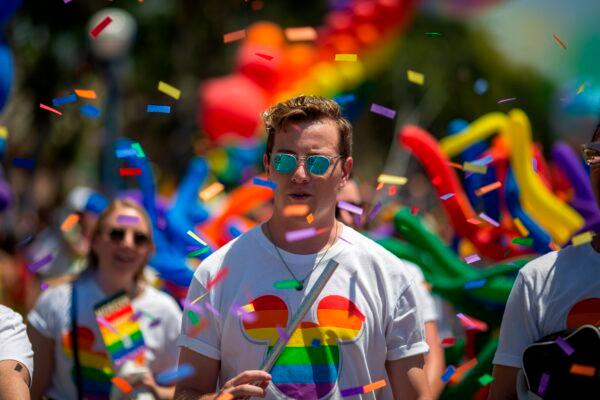 People from the Walt Disney Company participate in LA Pride Parade, an annual LGBTQ Pride celebration, in West Hollywood, California, on June 9, 2019. (David McNew/AFP via Getty Images)