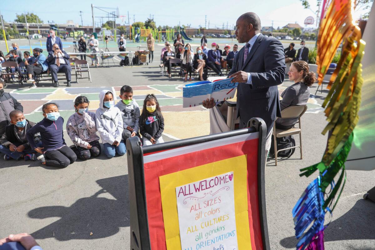 California State Superintendent of Schools Tony Thurmond reads from the book "Red: A Crayon's Story" to second-grade students at Nystrom Elementary School in Richmond, Calif., on May 17, 2022. (Justin Sullivan/Getty Images)
