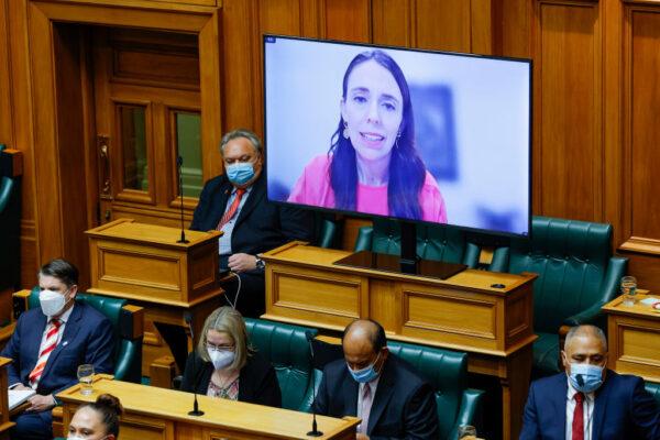 New Zealand Prime Minister Jacinda Ardern speaks via video link while in isolation due to COVID-19 during budget day 2022 at Parliament in Wellington, New Zealand, on May 19, 2022. (Hagen Hopkins/Getty Images)