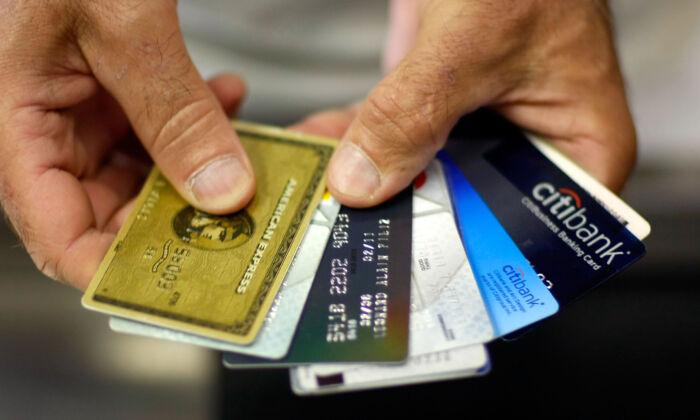 Consumers Dig Deeper in Debt as Inflation Prompts Credit Card Use for Daily Expenses