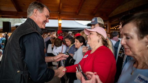 Former Sen. David Perdue greets supporters on March 7, 2022, at a campaign event in Commerce, Ga., for his race to unseat Gov. Brian Kemp. (Courtesy of the Perdue for governor campaign)