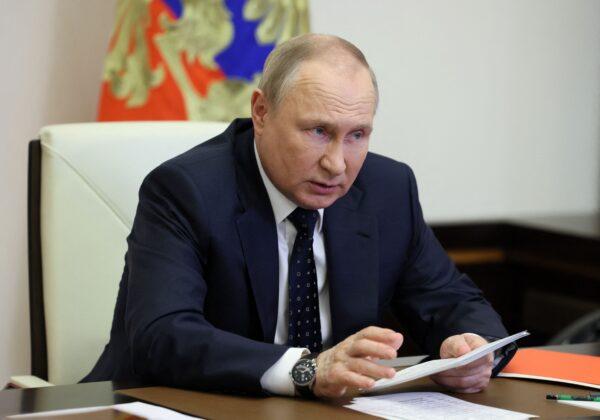 Russian President Vladimir Putin chairs a Security Council meeting via a video link at the Novo-Ogaryovo state residence outside Moscow, on May 20, 2022. (Mikhail Metzel/Sputnik/AFP via Getty Images)
